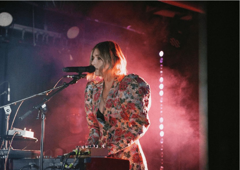 Musician singing on stage